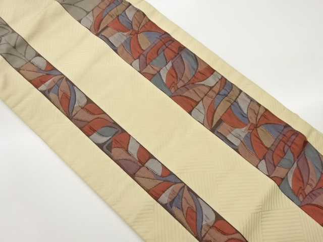 ふくれ織縞に抽象幾何学模様織出し名古屋帯